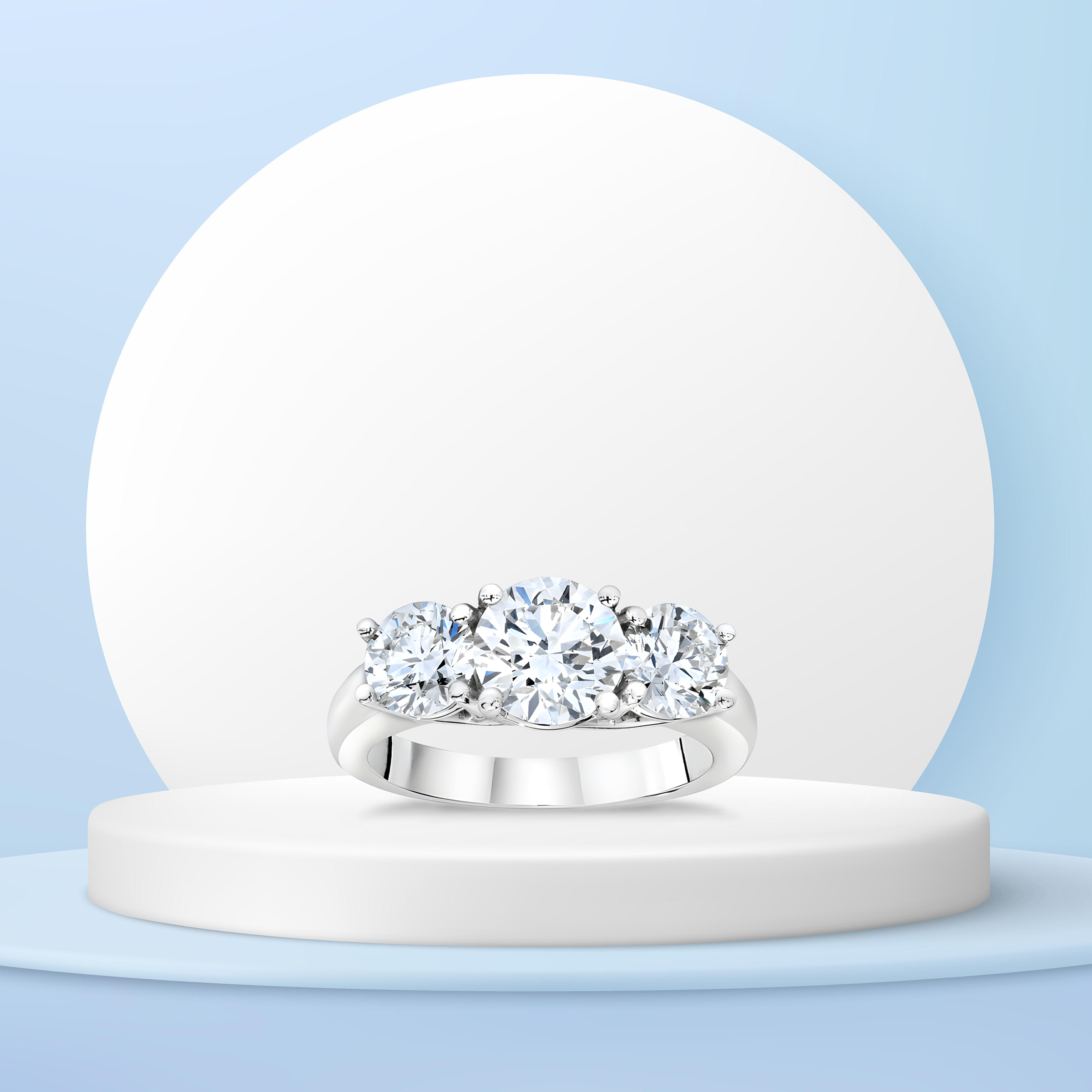 Round Brilliant Three Stone Diamond Ring in Platinum